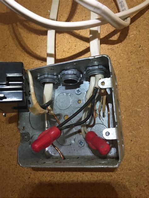 how to punch hole in junction box|wiring a punched out hole.